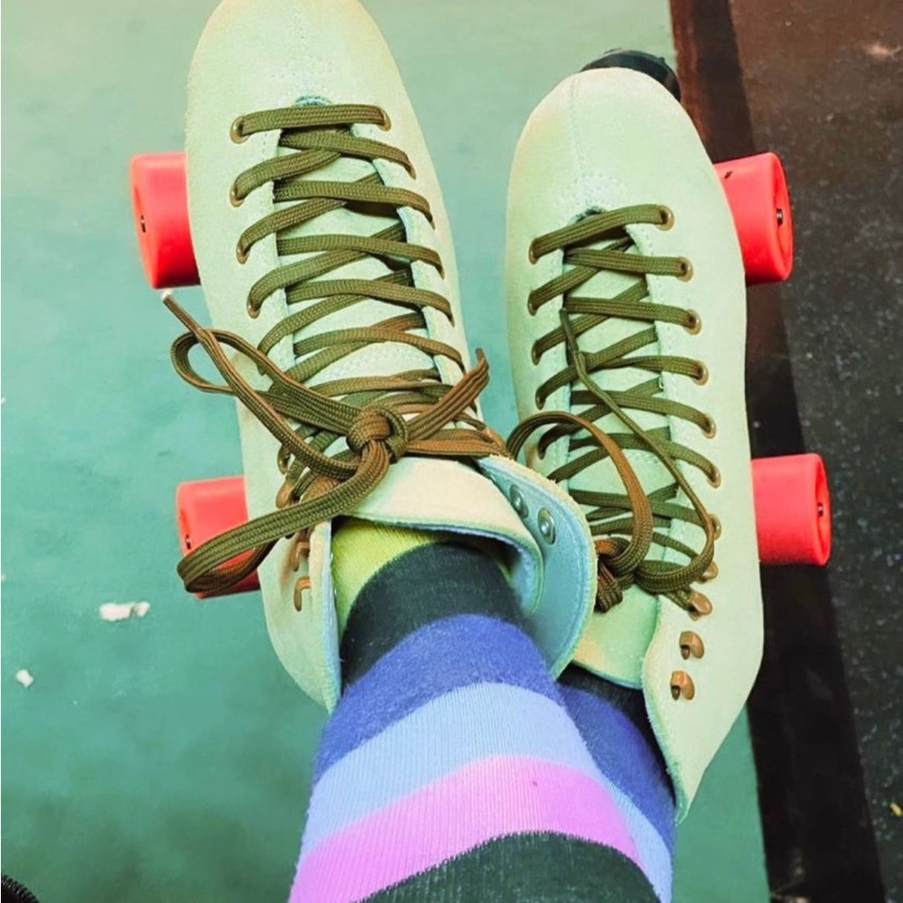 Green Roller Skates with Red Wheels